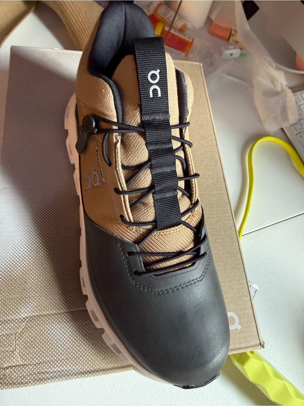 On Running Men's Athletic Shoe in Tan and Black - Picture 9 of 12